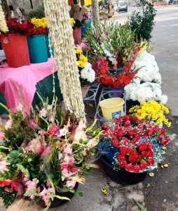 During early period a flower seller used to move from door to door selling flowers. During harvesting season flower sellers use to move from one field to the other and to present flowers to land lords. In return they get grains. Flowers are used on large scale for the decoration of Cars to carry bride grooms or both. Wedding is a good source of income to flower sellers.